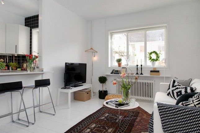 czarno-białe meszkanie,nowoczesny salon z kuchnią, otwarta zabudowa mieszkania,skandynawskie meszkanie,skandynawski styl czarno-białe meszkanie,nowoczesny salon z kuchnią, otwarta zabudowa mieszkania,skandynawskie meszkanie,skandynawski styl
